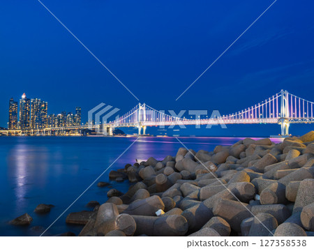 Busan: Illuminated Gwangan Bridge and The Bay 101 skyscrapers 127358538