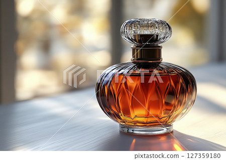 Perfume bottle with glossy on its glass surface, conveying elegance and sophistication. Ideal for high-end perfume advertisements. Perfume bottle with glossy on its glass surface, conveying elegance and sophistication. Ideal for high-end perfume advertisements. 127359180
