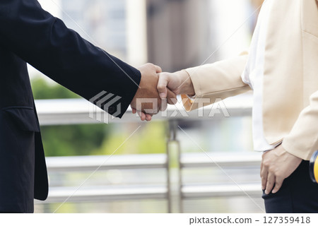 Lawyer partnership Businessman handshake together Notary lawfirm. Two Men Trust honesty business customer handshake promise respect partner. Diversity solidarity team Partner hands together teamwork Lawyer partnership Businessman handshake together Notary lawfirm. Two Men Trust honesty business customer handshake promise respect partner. Diversity solidarity team Partner hands together teamwork 127359418