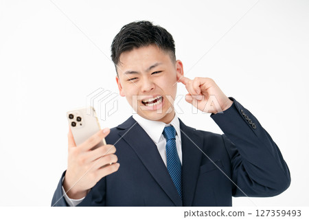 Young male business smartphone stress 127359493