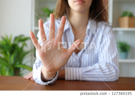 Woman hand at home gesturing number five 127360195