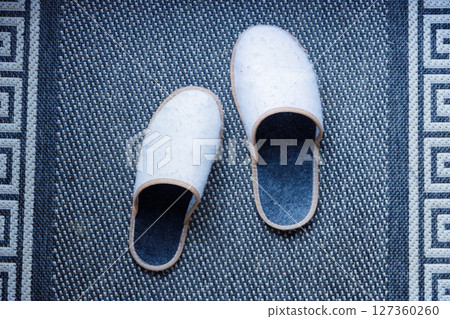 Cozy Traditional Slippers on a Stylish Rug: A Perfect Blend of Comfort and Aesthetic Appeal for Your Home D cor Cozy Traditional Slippers on a Stylish Rug: A Perfect Blend of Comfort and Aesthetic Appeal for Your Home D cor 127360260