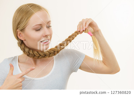 Blonde girl with braid hair Blonde girl with braid hair 127360820