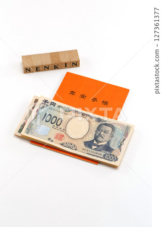 Pension book and banknote image Pension book and banknote image 127361377