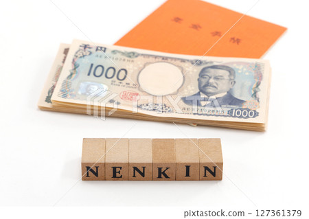 Pension book and banknote image 127361379