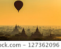 Balloon over plain of Bagan in misty morning, Myanmar 127362096