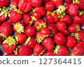 background Juicy ripe strawberries. Sweet healthy dessert, vitamin harvest. close up. 127364415