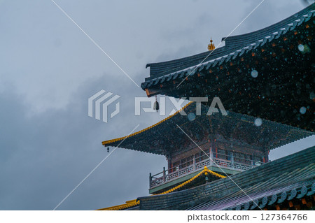 Ancient temple eaves and wind chimes in the rain Ancient temple eaves and wind chimes in the rain 127364766