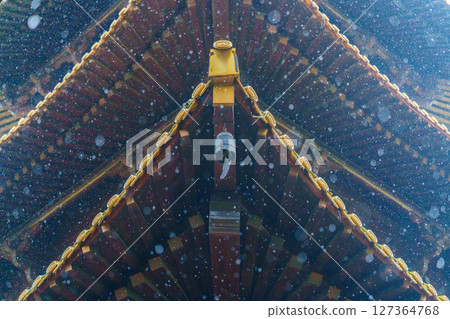 Ancient temple eaves and wind chimes in the rain 127364768