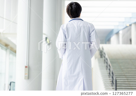Young doctor working in a hospital Young doctor working in a hospital 127365277