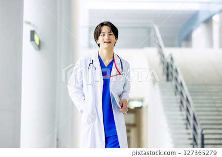Young doctor working in a hospital Young doctor working in a hospital 127365279