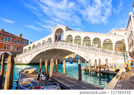 Rialto bridge and Grand Canal in Venice, Italy. Architecture and landmarks of Venice. Beautiful tourist attraction of Venice. 127365338