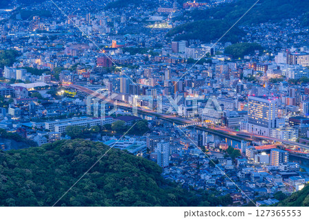 (Nagasaki Prefecture) The illuminated streets of Nagasaki as seen from the observation deck at the top of Mount Inasa (Nagasaki Prefecture) The illuminated streets of Nagasaki as seen from the observation deck at the top of Mount Inasa 127365553