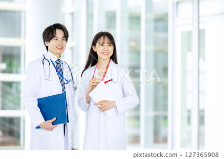 Medical team in white coats Medical team in white coats 127365908