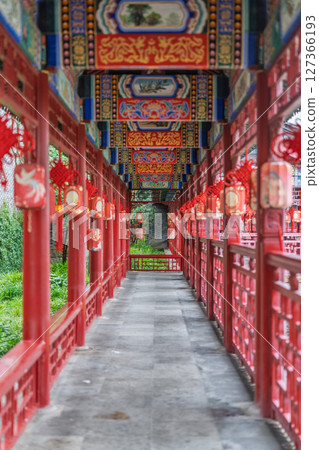 Ancient red corridor in Chinese courtyard Ancient red corridor in Chinese courtyard 127366193
