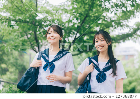A high school girl in summer clothes commuting to school A high school girl in summer clothes commuting to school 127368877