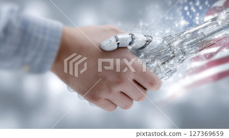 A human hand shakes a robotic hand, symbolizing collaboration amid American flags and tools during Labor Day A human hand shakes a robotic hand, symbolizing collaboration amid American flags and tools during Labor Day 127369659