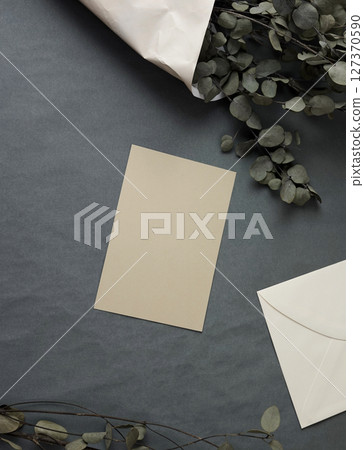 Real crafted photo brown blank card envelope eucalyptus gray bg mockup vertical template aesthetics 127370590