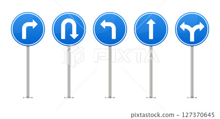 An assortment of various blue and white mandatory road signs on posts. An assortment of various blue and white mandatory road signs on posts. 127370645