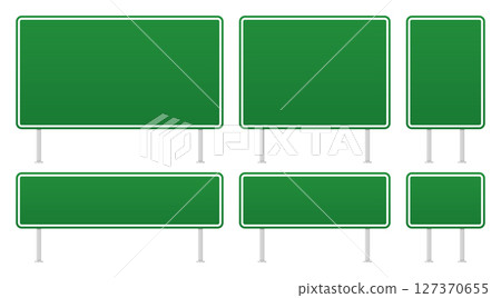 A collection of blank green road signs with white borders and metal posts. 127370655