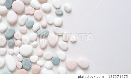 Pebbles Arranged in a Chaotic Pattern on a White Background Pebbles Arranged in a Chaotic Pattern on a White Background 127371475
