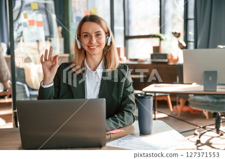 Portrait of young beautiful woman in formal clothes that is working in the office 127371553