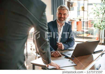 Business people are working together in the office 127371597