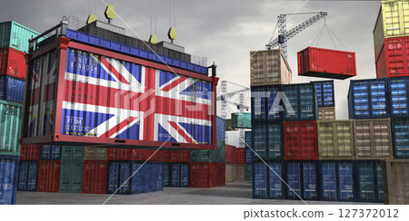 Cargo container with flag of United Kingdom lifted by crane at freight terminal - 3D illustration Cargo container with flag of United Kingdom lifted by crane at freight terminal - 3D illustration 127372012