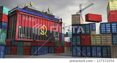 Cargo container with flag of Angola lifted by crane at freight terminal - 3D illustration 127372058