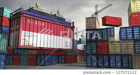 Cargo container with flag of Indonesia lifted by crane at freight terminal - 3D illustration 127372122