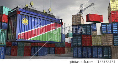 Cargo container with flag of Namibia lifted by crane at freight terminal - 3D illustration 127372171