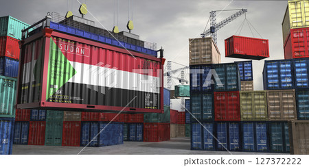 Cargo container with flag of Sudan lifted by crane at freight terminal - 3D illustration 127372222