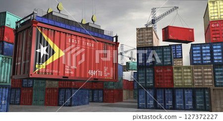 Cargo container with flag of East Timor lifted by crane at freight terminal - 3D illustration 127372227
