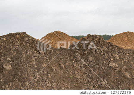 Soil on the ground as texture and background. 127372379