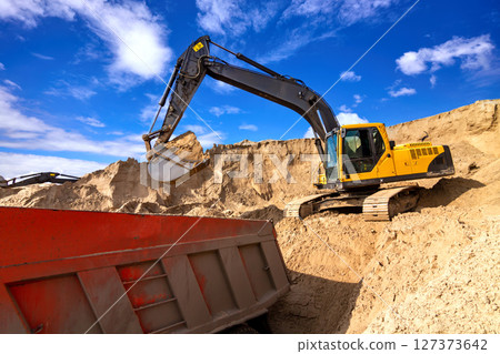 Excavator Loading Dumper Truck 127373642