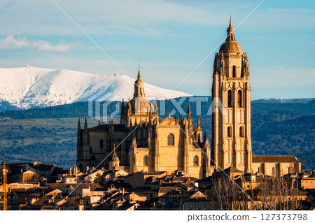 Breathtaking view of Segovia cathedral and cityscape with Guadarrama mountains. Breathtaking view of Segovia cathedral and cityscape with Guadarrama mountains. 127373798