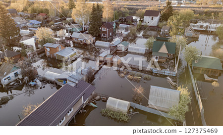 Floods on the planet, global warming. Climate change,natural disastersthe riot of nature. The apocalypse, catastrophes.Storms and destruction.The remnants of human life are floating in dirty water.End 127375469
