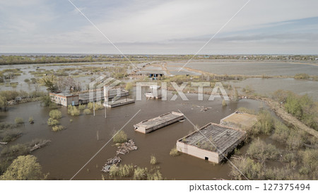 Floods on the planet, global warming. Climate change,natural disastersthe riot of nature. The apocalypse, catastrophes.Storms and destruction.The remnants of human life are floating in dirty water.End 127375494