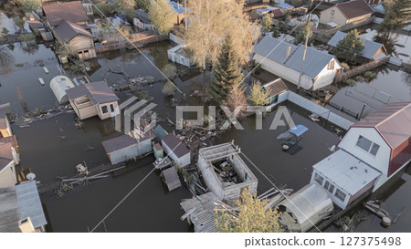 Floods on the planet, global warming. Climate change,natural disastersthe riot of nature. The apocalypse, catastrophes.Storms and destruction.The remnants of human life are floating in dirty water.End Floods on the planet, global warming. Climate change,natural disastersthe riot of nature. The apocalypse, catastrophes.Storms and destruction.The remnants of human life are floating in dirty water.End 127375498