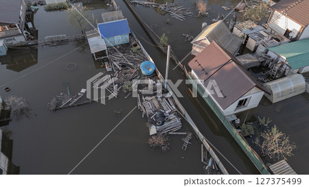 Floods on the planet, global warming. Climate change,natural disastersthe riot of nature. The apocalypse, catastrophes.Storms and destruction.The remnants of human life are floating in dirty water.End Floods on the planet, global warming. Climate change,natural disastersthe riot of nature. The apocalypse, catastrophes.Storms and destruction.The remnants of human life are floating in dirty water.End 127375499