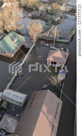 Floods on the planet, global warming. Climate change,natural disastersthe riot of nature. The apocalypse, catastrophes.Storms and destruction.The remnants of human life are floating in dirty water.End 127375513