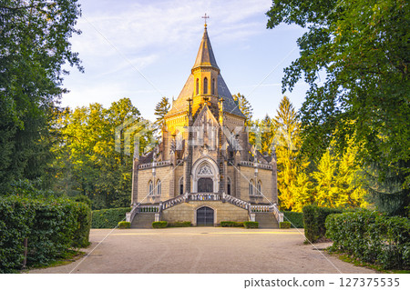 Schwarzenberg Tomb is a striking neo-Gothic structure located in Domanin, Czechia, surrounded by lush greenery and set against a tranquil sky, offering a peaceful atmosphere for visitors. Schwarzenberg Tomb is a striking neo-Gothic structure located in Domanin, Czechia, surrounded by lush greenery and set against a tranquil sky, offering a peaceful atmosphere for visitors. 127375535