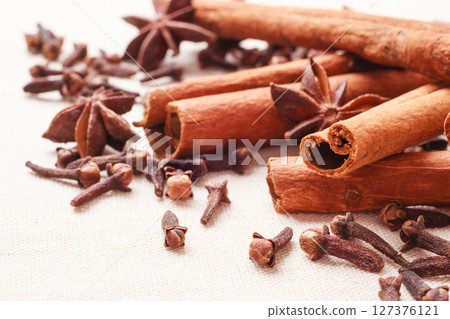 Spices cinnamon sticks anise stars and cloves Spices cinnamon sticks anise stars and cloves 127376121