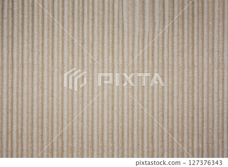 Corrugated Cardboard Texture. Vertical Ribbed Paper Surface Close Up. Stock photo. 127376343