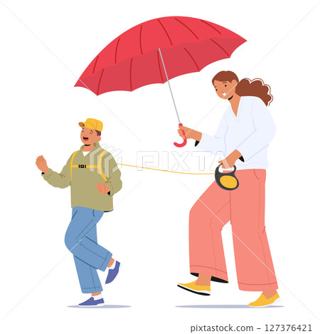 Overprotective mother walking with son holding child on leash controlling activity outdoors 127376421
