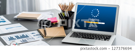 Data analysis dashboard display on laptop screen on office table. Insight Data analysis dashboard display on laptop screen on office table. Insight 127376694
