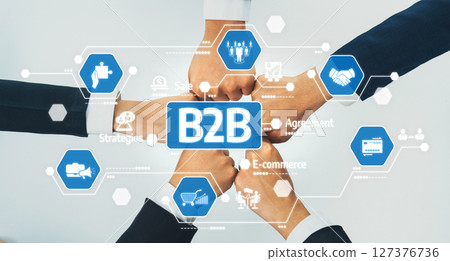 Business to Business Partnership Concept with Hands Joining Together for Collaboration and Success in E-commerce and Strategic Agreements. Amity Business to Business Partnership Concept with Hands Joining Together for Collaboration and Success in E-commerce and Strategic Agreements. Amity 127376736