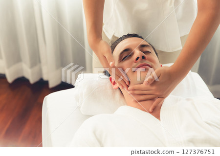 Caucasian man enjoying relaxing anti-stress head massage. Quiescent Caucasian man enjoying relaxing anti-stress head massage. Quiescent 127376751