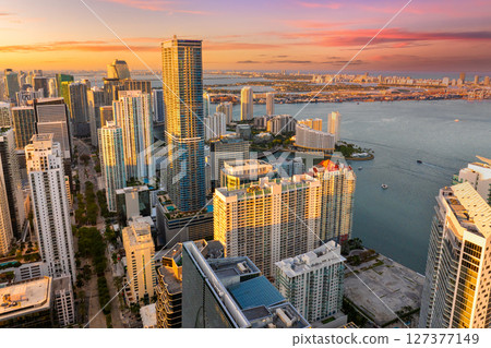 View from above of waterfront buildings in downtown district of Miami, Florida, USA. American city with business financial district at sunset View from above of waterfront buildings in downtown district of Miami, Florida, USA. American city with business financial district at sunset 127377149