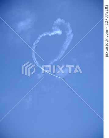Acrobatic flight Propeller plane Making a heart Acrobatic flight Propeller plane Making a heart 127378192